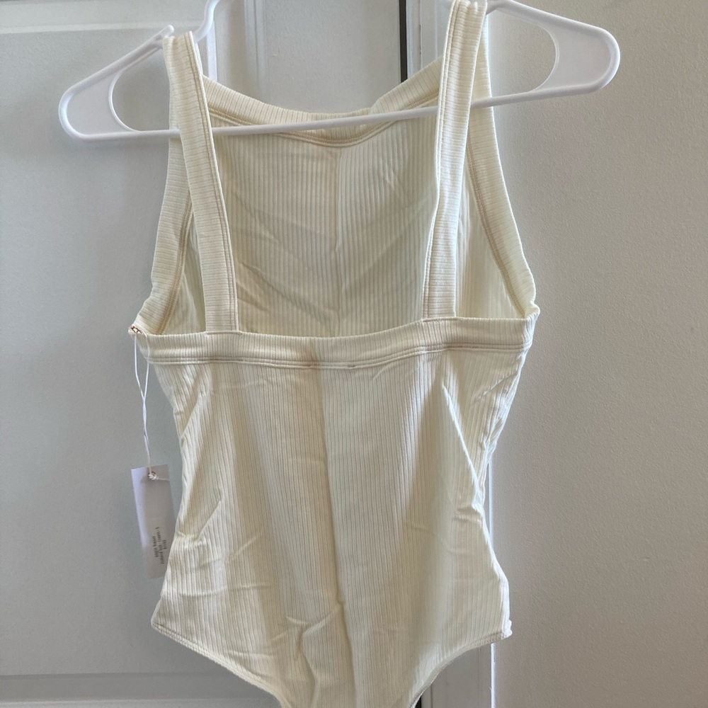 NWT Designer Creme Ribbed Bodysuit